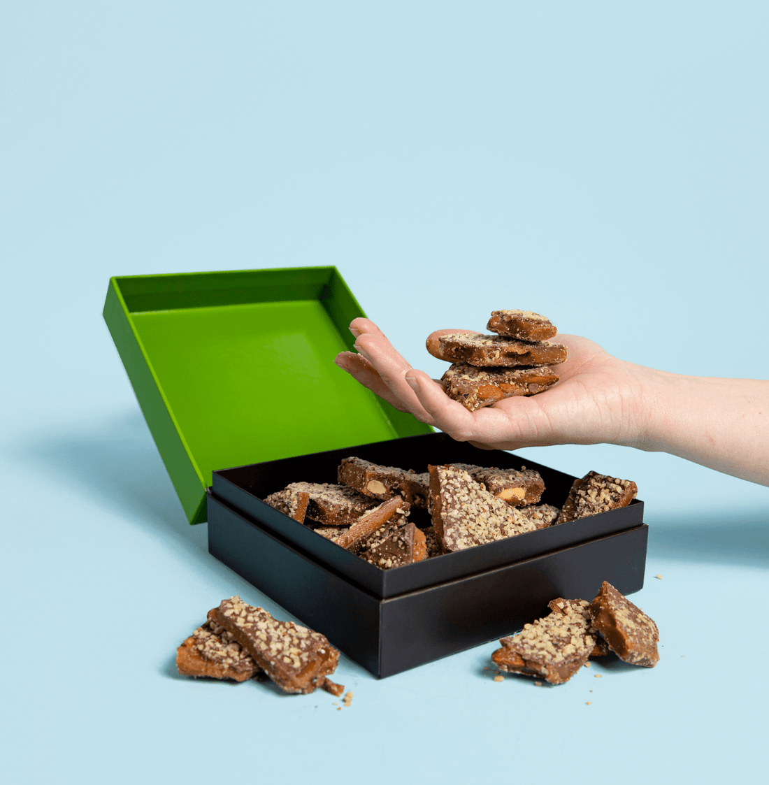 Milk Chocolate Almond Toffee open box displaying toffee